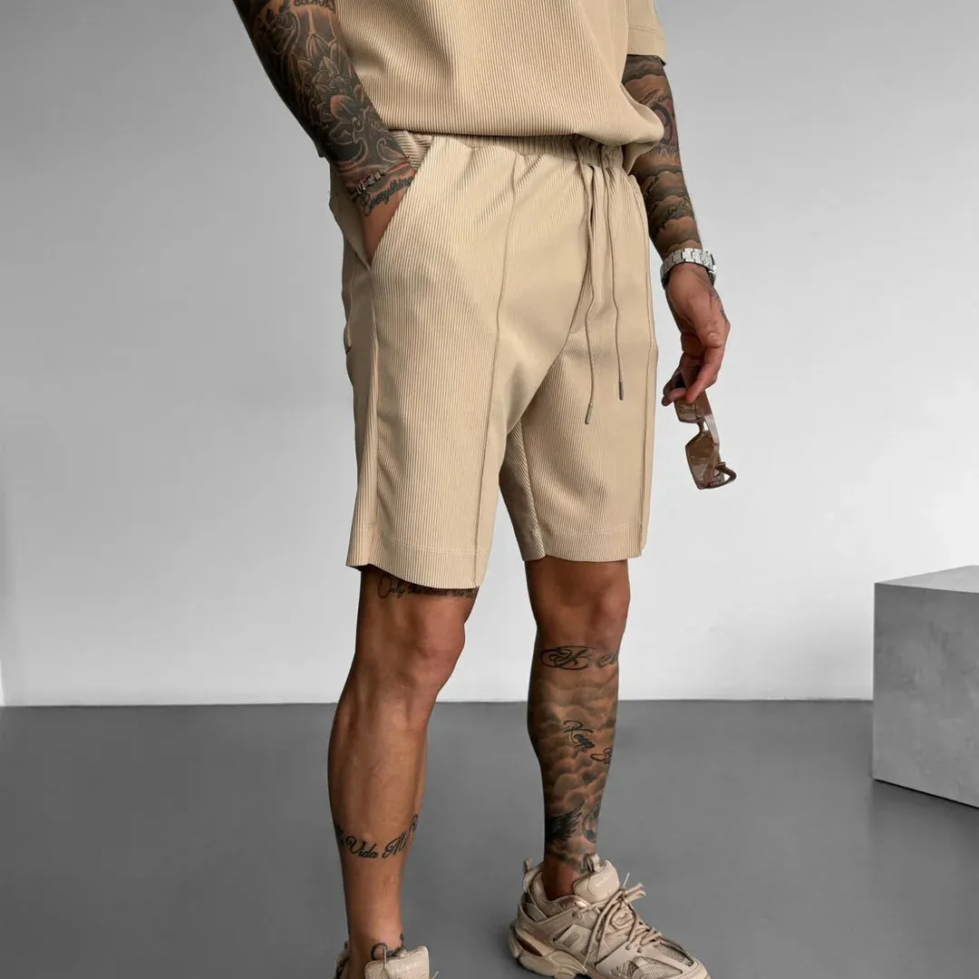 LOOSE FIT TEXTURED SEAM SHORTS - TAN