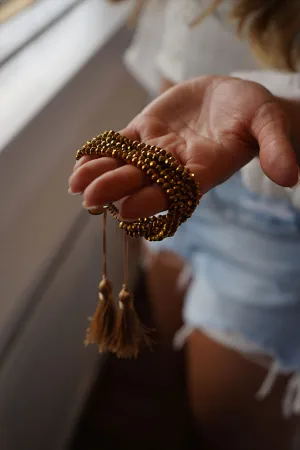 Multiple layered beaded adjustable bracelet
