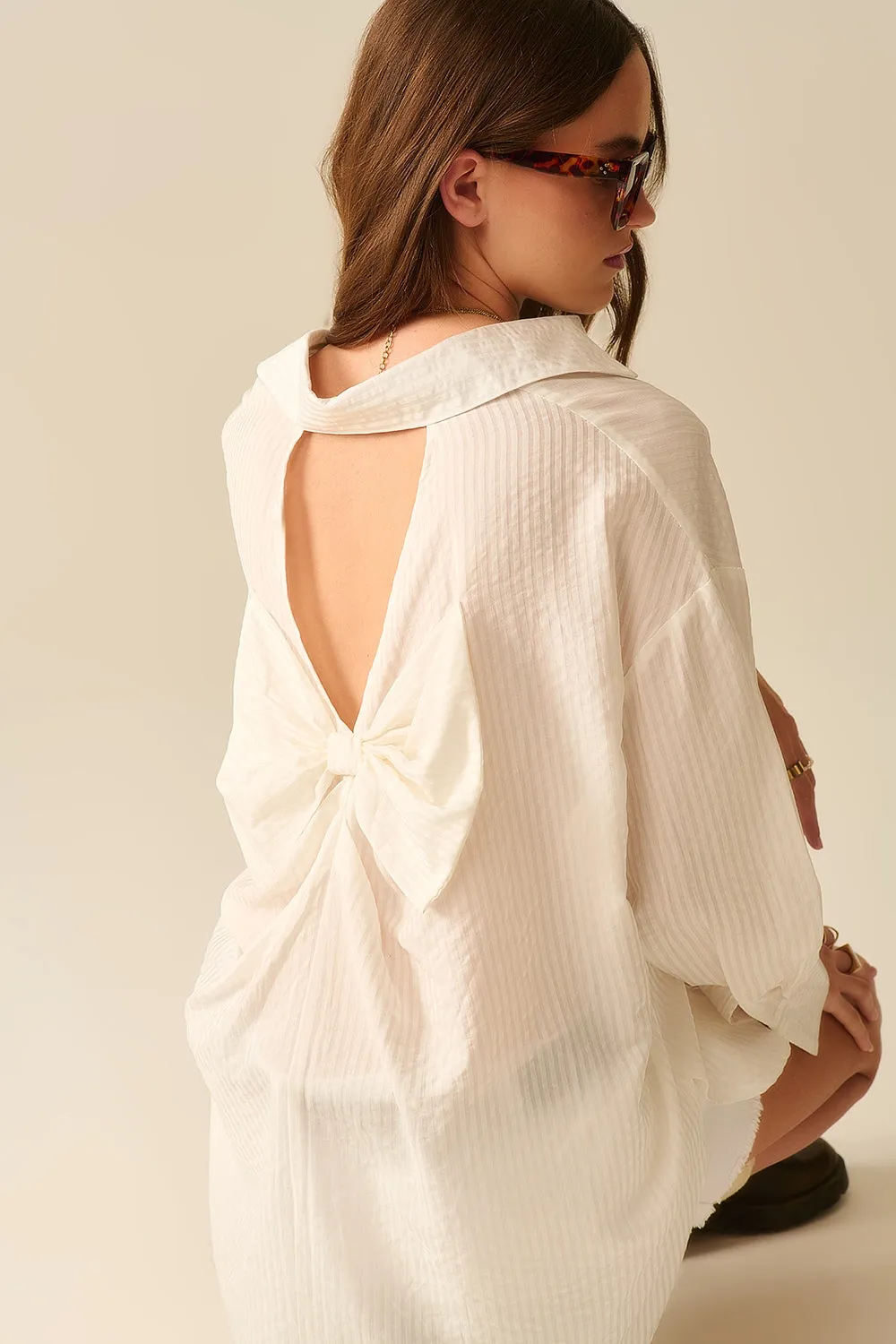 oversized white shirt with bow in the back